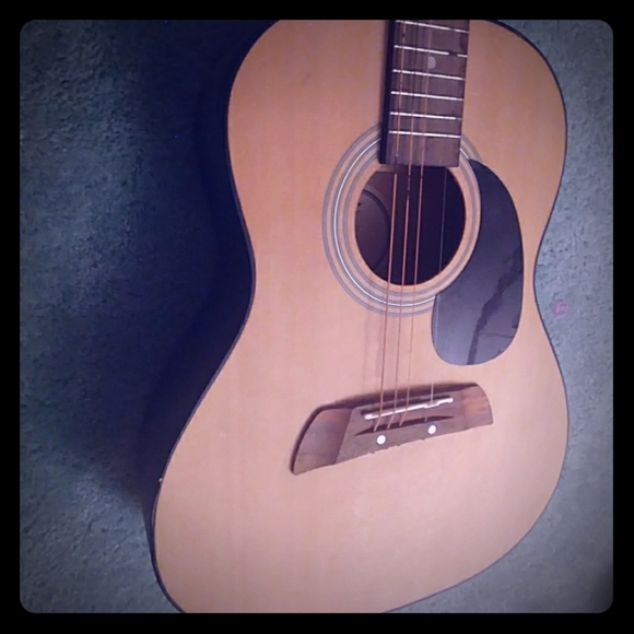 Guitar - Picture 1 of 3